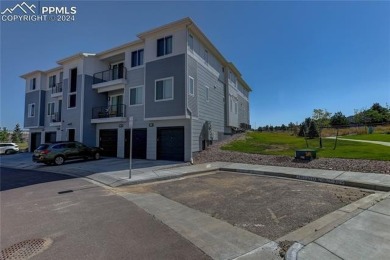 Sunny, corner-unit townhome perfectly positioned to enjoy the on Pine Creek Golf Club in Colorado - for sale on GolfHomes.com, golf home, golf lot