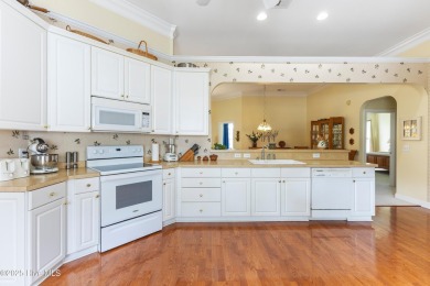 This well-maintained residence spans approximately 2,234 sq ft on Sea Trail Golf Resort in North Carolina - for sale on GolfHomes.com, golf home, golf lot