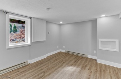 Welcome to your cozy Lake Mohawk retreat! This updated home sits on Lake Mohawk Golf Club in Ohio - for sale on GolfHomes.com, golf home, golf lot