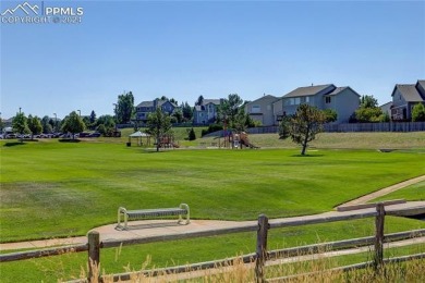 Sunny, corner-unit townhome perfectly positioned to enjoy the on Pine Creek Golf Club in Colorado - for sale on GolfHomes.com, golf home, golf lot