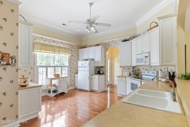 This well-maintained residence spans approximately 2,234 sq ft on Sea Trail Golf Resort in North Carolina - for sale on GolfHomes.com, golf home, golf lot