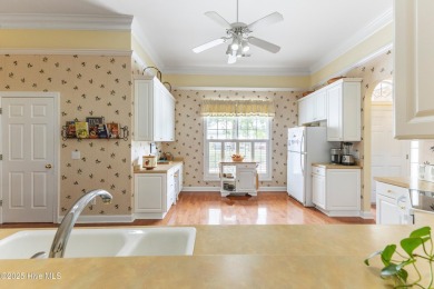 This well-maintained residence spans approximately 2,234 sq ft on Sea Trail Golf Resort in North Carolina - for sale on GolfHomes.com, golf home, golf lot