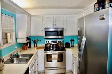 Great second floor 2 bedroom, 2 bath condo with large patio on Deer Creek Golf Club in Florida - for sale on GolfHomes.com, golf home, golf lot