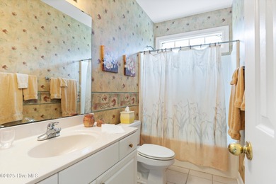 This well-maintained residence spans approximately 2,234 sq ft on Sea Trail Golf Resort in North Carolina - for sale on GolfHomes.com, golf home, golf lot