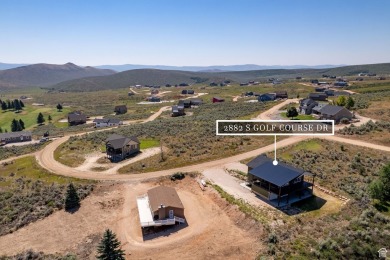 Discover the charm of this beautiful cabin located near the on Bear Lake Golf Course in Utah - for sale on GolfHomes.com, golf home, golf lot