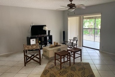 Great second floor 2 bedroom, 2 bath condo with large patio on Deer Creek Golf Club in Florida - for sale on GolfHomes.com, golf home, golf lot