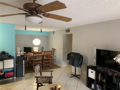 Great second floor 2 bedroom, 2 bath condo with large patio on Deer Creek Golf Club in Florida - for sale on GolfHomes.com, golf home, golf lot