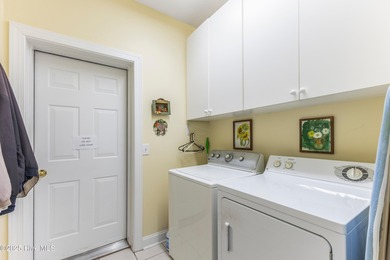 This well-maintained residence spans approximately 2,234 sq ft on Sea Trail Golf Resort in North Carolina - for sale on GolfHomes.com, golf home, golf lot