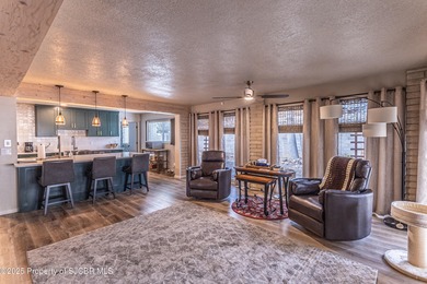 This impeccably maintained single-level mid-century home is on San Juan Country Club in New Mexico - for sale on GolfHomes.com, golf home, golf lot