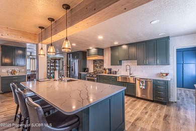 This impeccably maintained single-level mid-century home is on San Juan Country Club in New Mexico - for sale on GolfHomes.com, golf home, golf lot