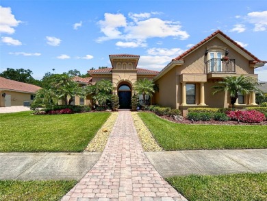 Lovely Meditterrean home welcomes you through rustic double on The Club at Eaglebrooke in Florida - for sale on GolfHomes.com, golf home, golf lot