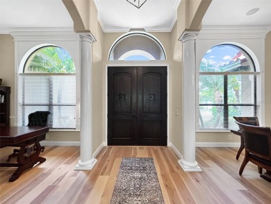 Lovely Meditterrean home welcomes you through rustic double on The Club at Eaglebrooke in Florida - for sale on GolfHomes.com, golf home, golf lot