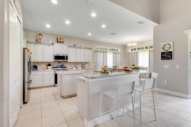 Welcome to this spacious and beautifully maintained home located on Kissimmee Bay Country Club in Florida - for sale on GolfHomes.com, golf home, golf lot