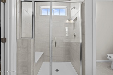 Welcome to the Boardwalk, a stylish, one-level home with modern on Sound Golf Links at Albemarle Plantation in North Carolina - for sale on GolfHomes.com, golf home, golf lot