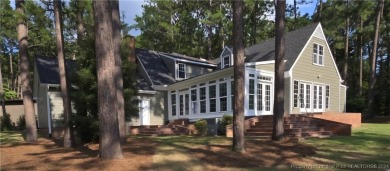 This 4-bedroom, 3.1-bath waterfront property is nestled in the on Gates Four Golf and Country Club in North Carolina - for sale on GolfHomes.com, golf home, golf lot