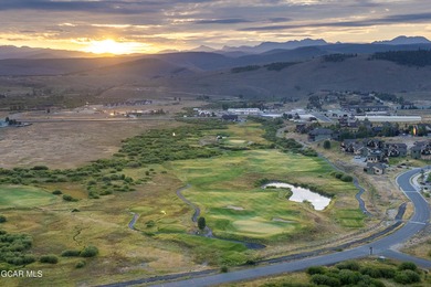 Watch video! Premium .32-acre golf course lot at acclaimed Grand on Grand Elk Ranch and Club in Colorado - for sale on GolfHomes.com, golf home, golf lot