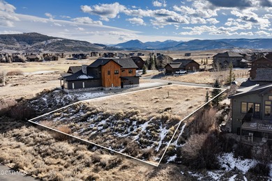 Watch video! Premium .32-acre golf course lot at acclaimed Grand on Grand Elk Ranch and Club in Colorado - for sale on GolfHomes.com, golf home, golf lot