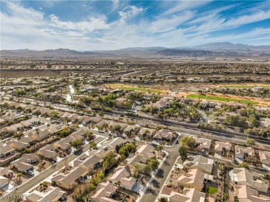 Located in the 55+ Sun City Anthem community, this beautifully on Rio Secco Golf Club in Nevada - for sale on GolfHomes.com, golf home, golf lot