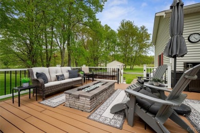 Nestled gracefully against the backdrop of the beautiful Barker on Barker Brook Golf Club in New York - for sale on GolfHomes.com, golf home, golf lot
