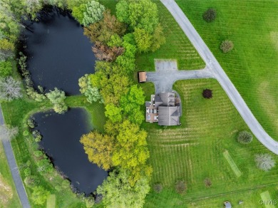Nestled gracefully against the backdrop of the beautiful Barker on Barker Brook Golf Club in New York - for sale on GolfHomes.com, golf home, golf lot