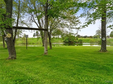 Nestled gracefully against the backdrop of the beautiful Barker on Barker Brook Golf Club in New York - for sale on GolfHomes.com, golf home, golf lot