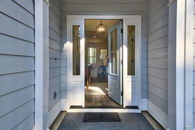 TAKE A LOOK AT THIS EXCEPTIONAL HOME - The Flowering Peach, one on Monticello Golf Club At Savannah Lakes in South Carolina - for sale on GolfHomes.com, golf home, golf lot