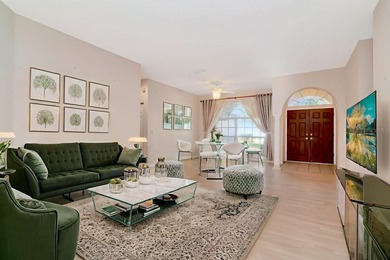 Welcome to this beautifully appointed residence located in one on East Lake Woodlands Country Club in Florida - for sale on GolfHomes.com, golf home, golf lot