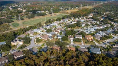 Welcome to this beautifully appointed residence located in one on East Lake Woodlands Country Club in Florida - for sale on GolfHomes.com, golf home, golf lot