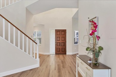 Golf community paradise reimagined. This home was meticulously on TPC Prestancia in Florida - for sale on GolfHomes.com, golf home, golf lot