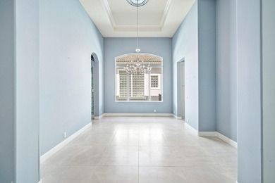 Discover luxury living at 326 Charroux Drive in prestigious on Frenchmans Reserve in Florida - for sale on GolfHomes.com, golf home, golf lot