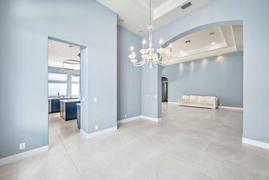 Discover luxury living at 326 Charroux Drive in prestigious on Frenchmans Reserve in Florida - for sale on GolfHomes.com, golf home, golf lot