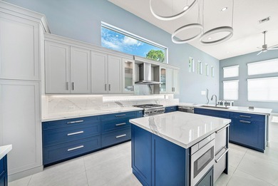 Discover luxury living at 326 Charroux Drive in prestigious on Frenchmans Reserve in Florida - for sale on GolfHomes.com, golf home, golf lot