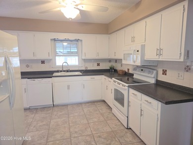 Loads of value in this inviting home backing to River Bend Golf on River Bend Golf and Country Club in North Carolina - for sale on GolfHomes.com, golf home, golf lot