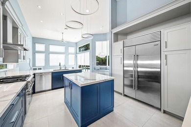 Discover luxury living at 326 Charroux Drive in prestigious on Frenchmans Reserve in Florida - for sale on GolfHomes.com, golf home, golf lot