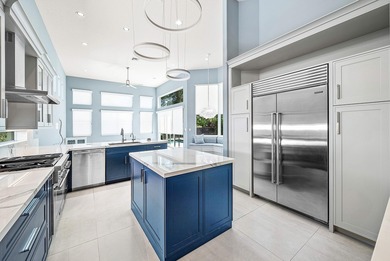 Discover luxury living at 326 Charroux Drive in prestigious on Frenchmans Reserve in Florida - for sale on GolfHomes.com, golf home, golf lot