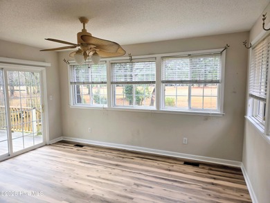 Loads of value in this inviting home backing to River Bend Golf on River Bend Golf and Country Club in North Carolina - for sale on GolfHomes.com, golf home, golf lot