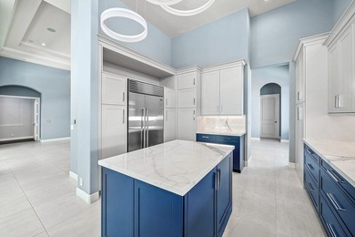 Discover luxury living at 326 Charroux Drive in prestigious on Frenchmans Reserve in Florida - for sale on GolfHomes.com, golf home, golf lot