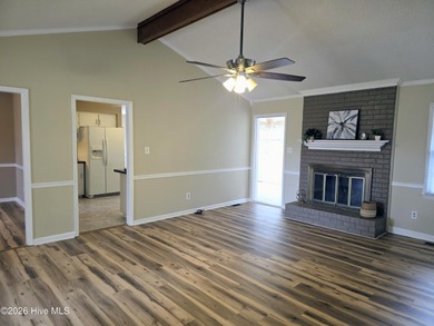 Loads of value in this inviting home backing to River Bend Golf on River Bend Golf and Country Club in North Carolina - for sale on GolfHomes.com, golf home, golf lot