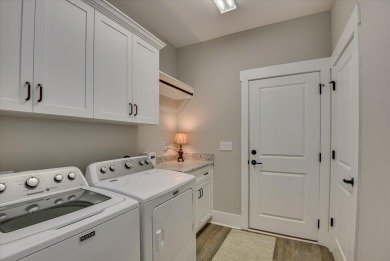 Welcome Home to 142 Godfrey Drive: Your Private Oasis in on Monticello Golf Club At Savannah Lakes in South Carolina - for sale on GolfHomes.com, golf home, golf lot