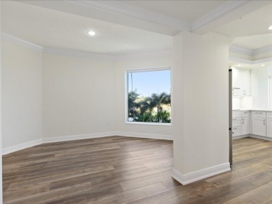 THIS CONDOMINIUM SOUNDS LIKE A DREAM COME TRUE. THE COMBINATION on Hammock Bay in Florida - for sale on GolfHomes.com, golf home, golf lot