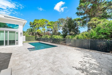 Discover luxury living at 326 Charroux Drive in prestigious on Frenchmans Reserve in Florida - for sale on GolfHomes.com, golf home, golf lot