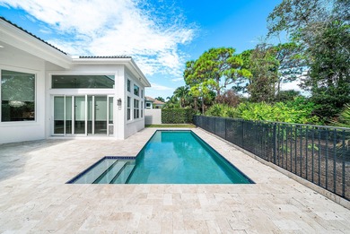 Discover luxury living at 326 Charroux Drive in prestigious on Frenchmans Reserve in Florida - for sale on GolfHomes.com, golf home, golf lot