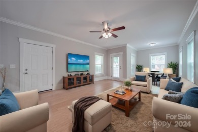 Come tour this beautifully updated home - your perfect escape on Cedarwood Country Club in North Carolina - for sale on GolfHomes.com, golf home, golf lot