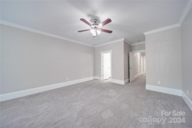 Come tour this beautifully updated home - your perfect escape on Cedarwood Country Club in North Carolina - for sale on GolfHomes.com, golf home, golf lot