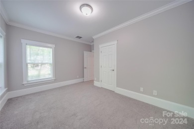 Come tour this beautifully updated home - your perfect escape on Cedarwood Country Club in North Carolina - for sale on GolfHomes.com, golf home, golf lot