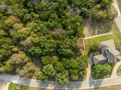 Serenity awaits!  At just over .25 acre, this beautifully wooded on White Bluff Resort - Old Course in Texas - for sale on GolfHomes.com, golf home, golf lot
