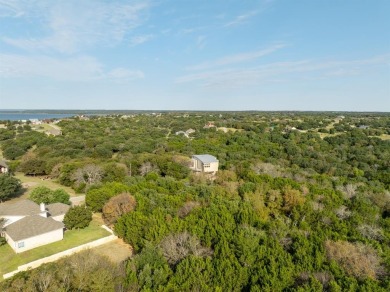 Serenity awaits!  At just over .25 acre, this beautifully wooded on White Bluff Resort - Old Course in Texas - for sale on GolfHomes.com, golf home, golf lot
