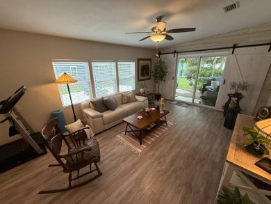 This beautifully updated stucco home is located only steps to on Del Tura Golf and Country Club in Florida - for sale on GolfHomes.com, golf home, golf lot