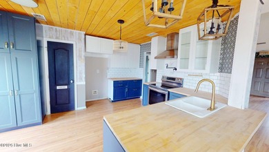 Just a little bit of work will make this house shine! Located in on Eagle Creek Golf Club and Grill in North Carolina - for sale on GolfHomes.com, golf home, golf lot