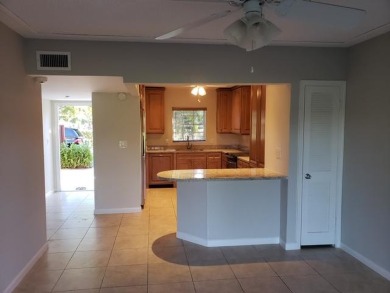 This spacious and beautiful end unit townhome has recently been on Palm-Aire Country Club and Resort - Palms in Florida - for sale on GolfHomes.com, golf home, golf lot